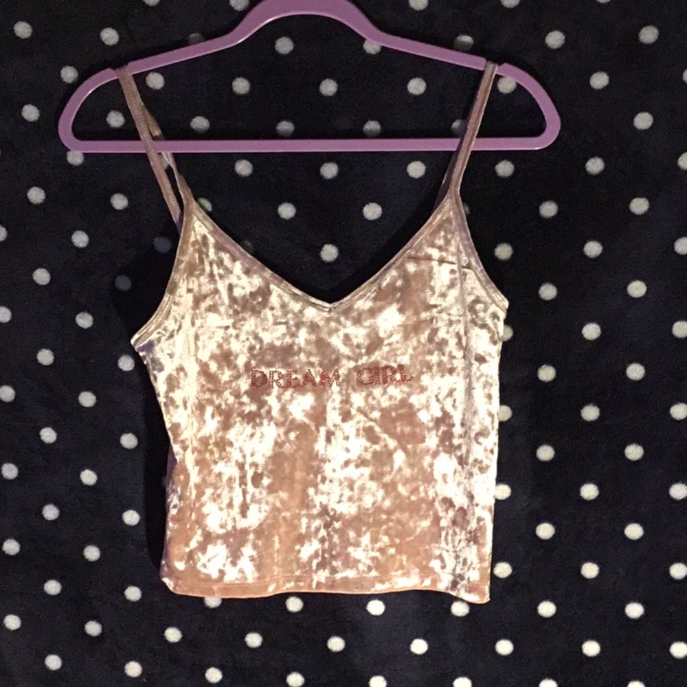 A pink crop top very cute